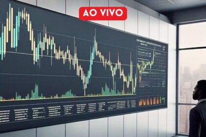 Homem observa gráfico de ações em sala moderna com painel grande, destacando análise financeira em tempo real.