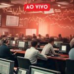 Homens em uma sala de operações observam gráficos em múltiplas telas, enquanto cotações piscam.