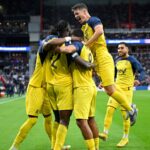 Promise David celebrates with team-mates after scoring for Union Saint-Gilloise against PSV in the Champions League