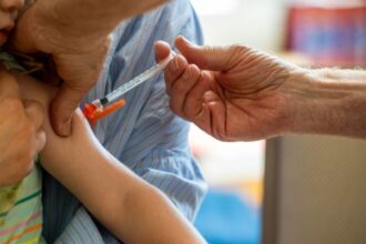 With no guidelines yet from CDC, getting a COVID shot remains confusing : Shots