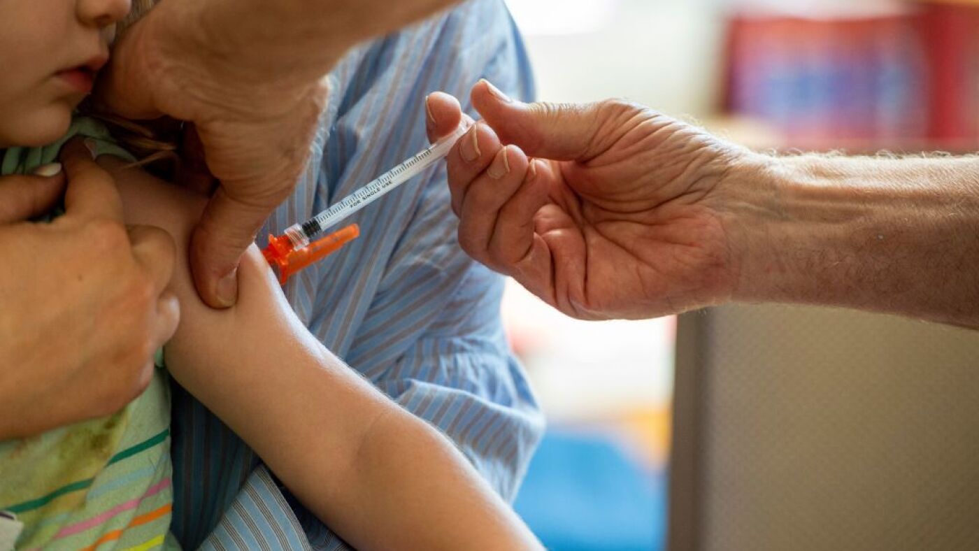 With no guidelines yet from CDC, getting a COVID shot remains confusing : Shots