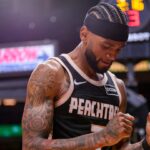 Atlanta Hawks guard Nickeil Alexander-Walker reacts after a basket against the Detroit Pistons in the fourth quarter at State Farm Arena
