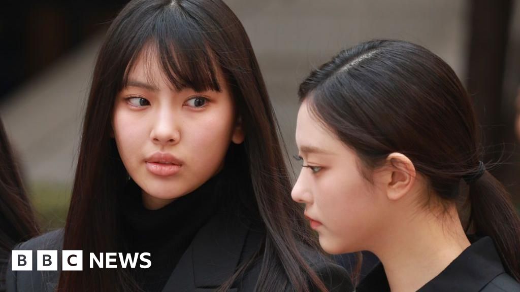 Membros do grupo de K-pop voltam para a gravadora após disputa jurídica All members of K-pop group set to return to label after legal battle