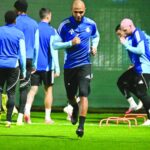 Al Gharafa's Yacine Brahimi warms up during a training session in Doha Sunday, on the eve of the AFC Champions League match against UAE 'Al Wahda.