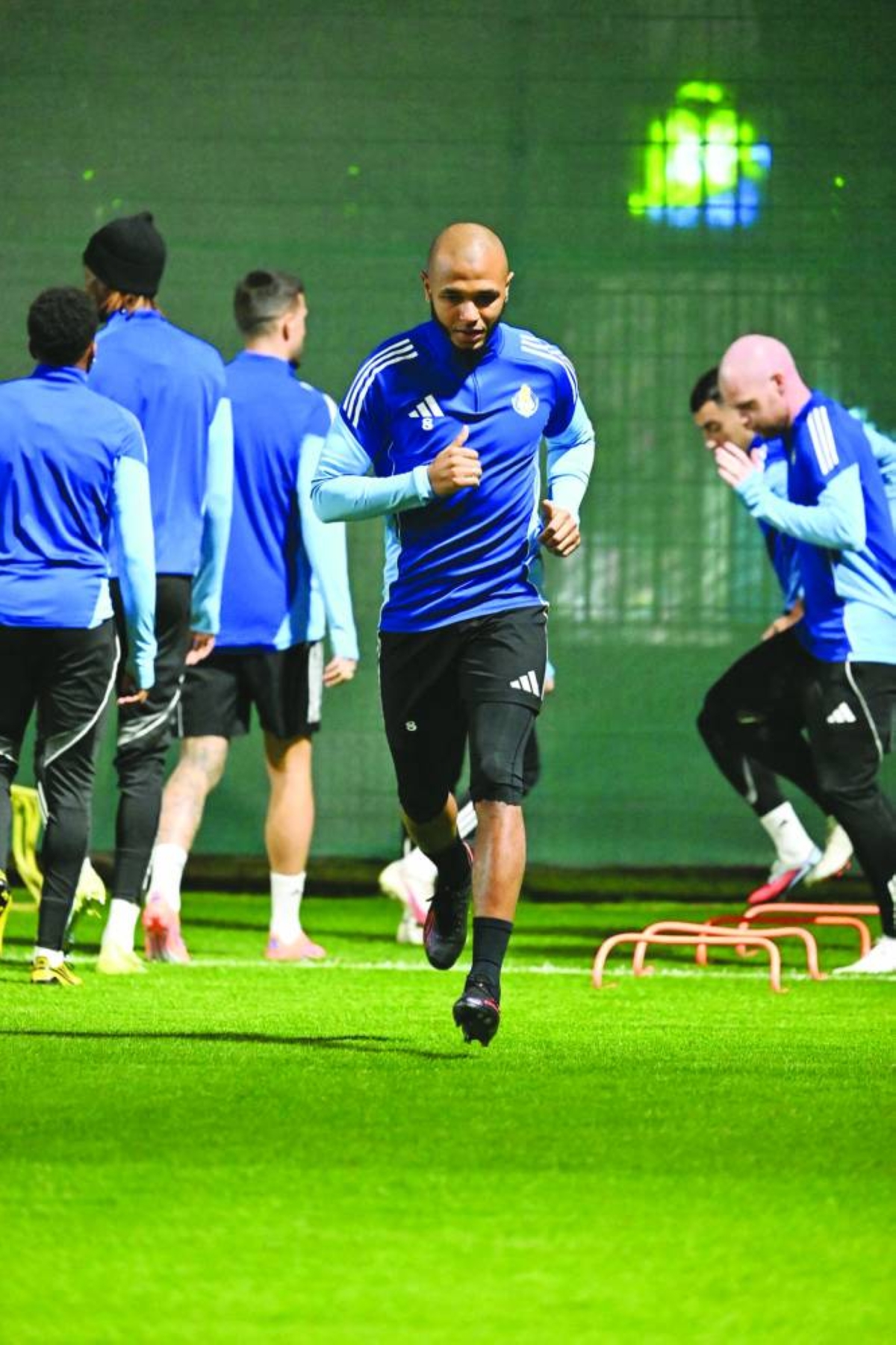 Al Gharafa's Yacine Brahimi warms up during a training session in Doha Sunday, on the eve of the AFC Champions League match against UAE 'Al Wahda.