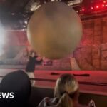 Disney World cast member hurt stopping 180-kg fake boulder from hitting audience